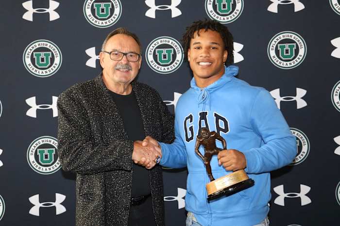 Justin Flowe accepts the 2019 Butkus Award, given to the top linebackers at the high school, college, and professional levels.